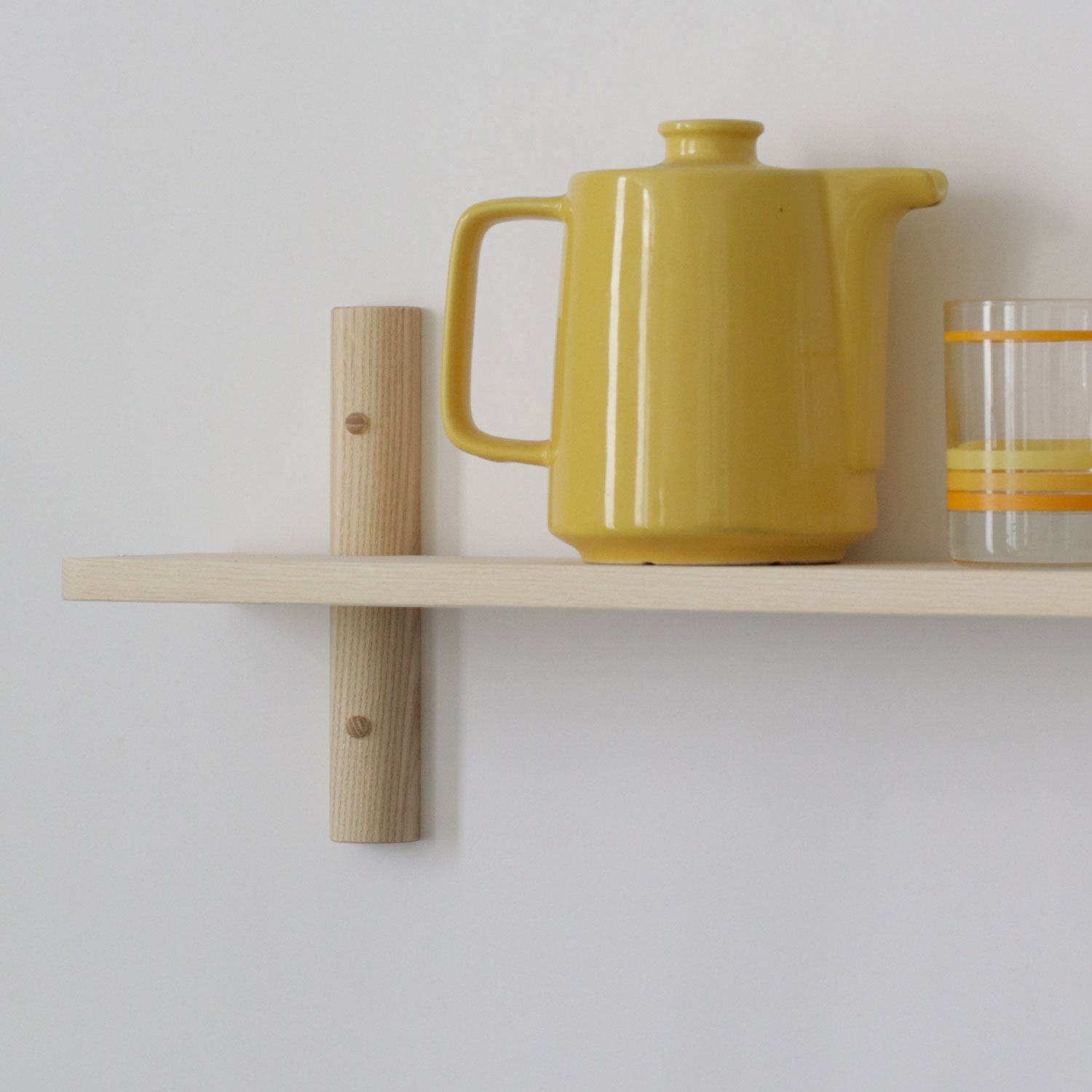 Modern floating shelf with brackets