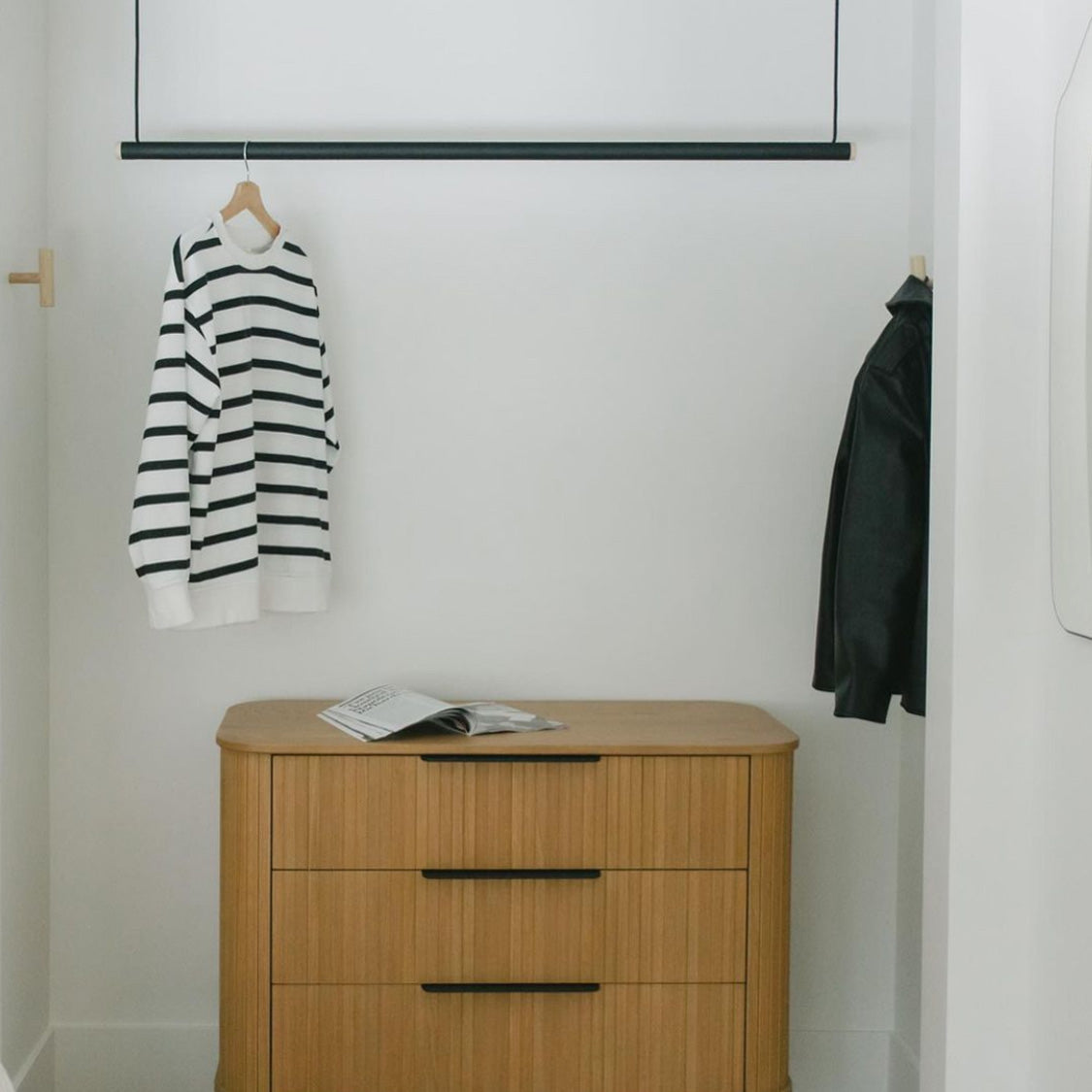 Hanging Clothes Rack in Closet